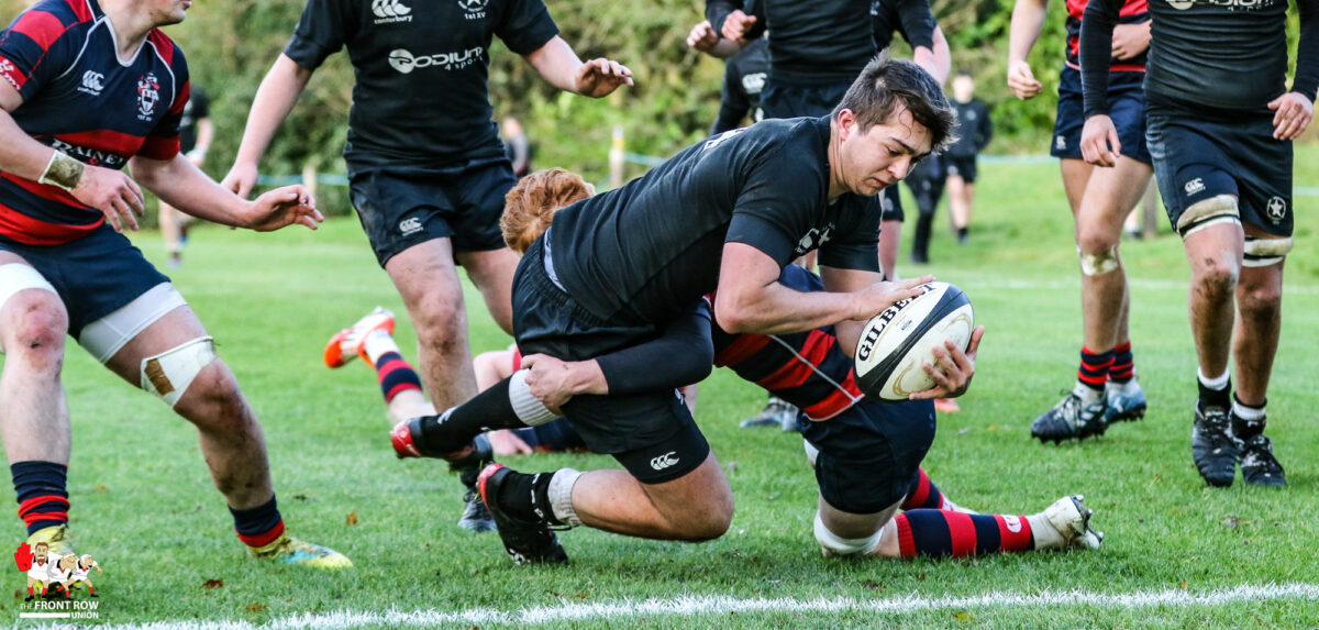 CCBs Tom Robinson goes over for the opening try against Ballymena Academy.