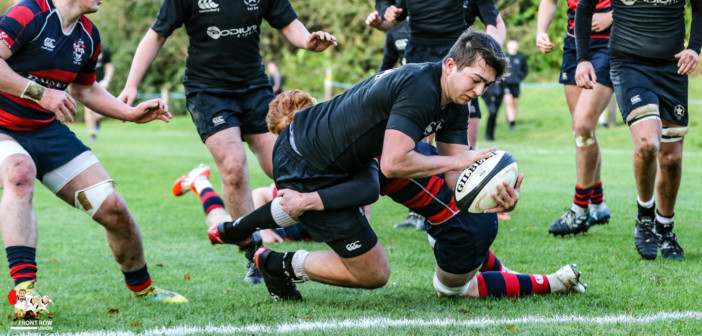 CCBs Tom Robinson goes over for the opening try against Ballymena Academy.