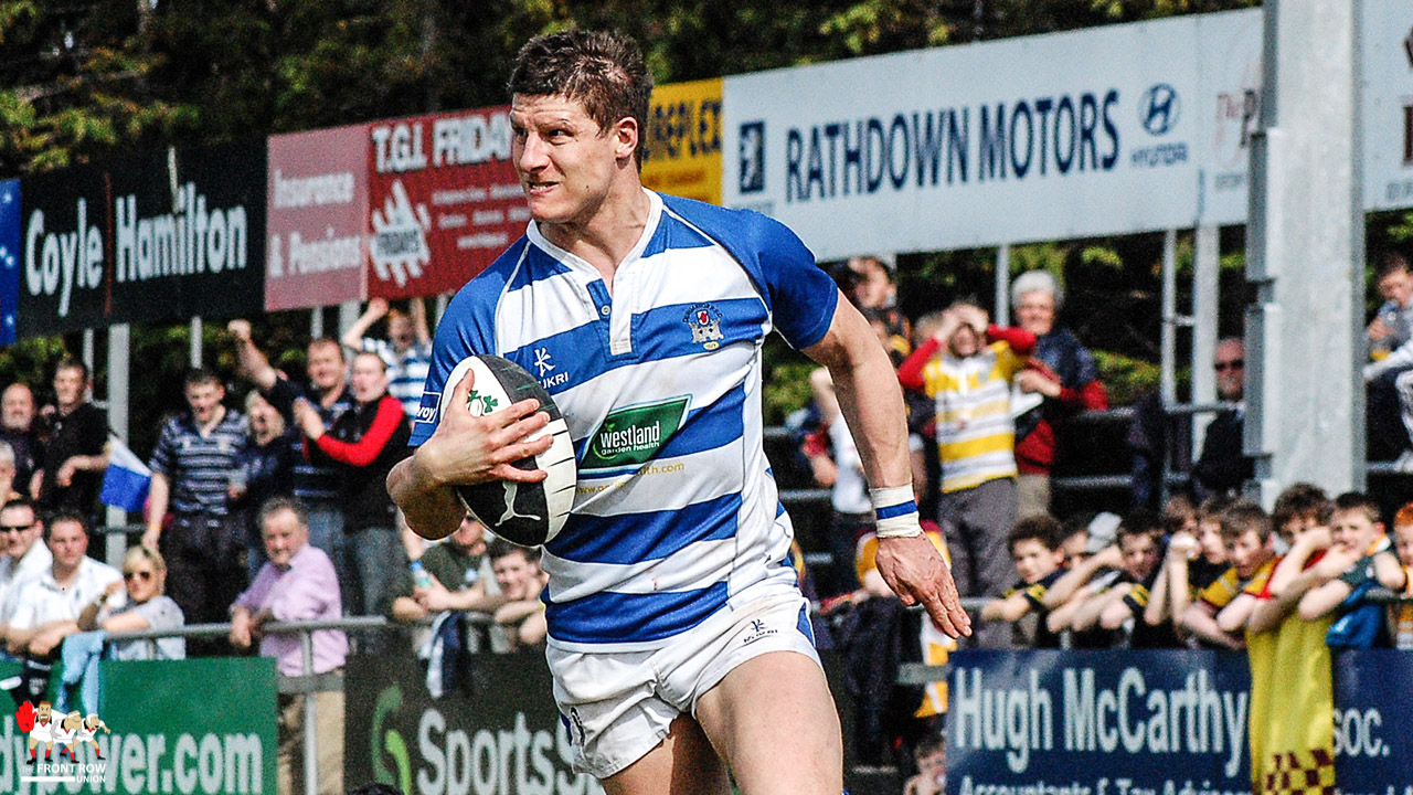 A determined Paul Magee sprints clear for Dungannon's opening try. 